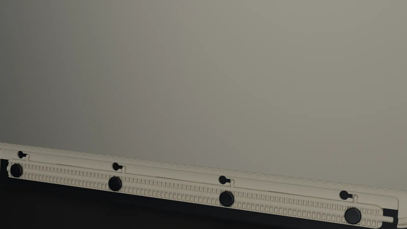 Close-up of the Palisade detachable scour manifold at the base of a plate
