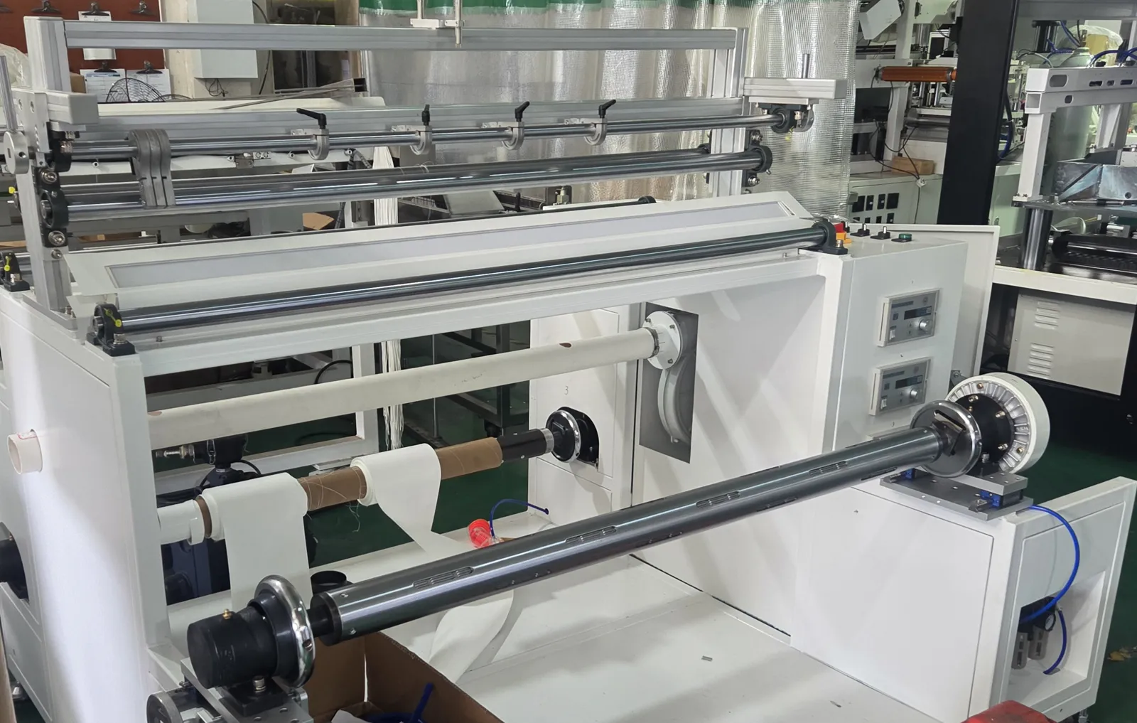 Membrane roll cutting machine in the Zyramic shop